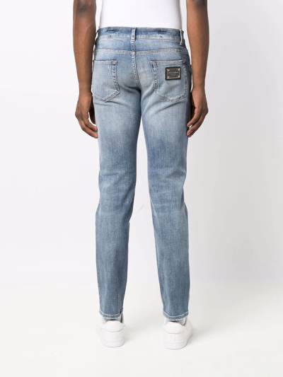 Shop Dolce & Gabbana Distressed Slim-fit Jeans In Blau