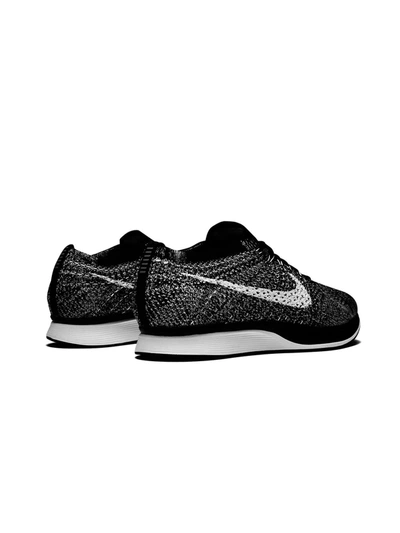 Shop Nike Flyknit Racer Sneakers In Black