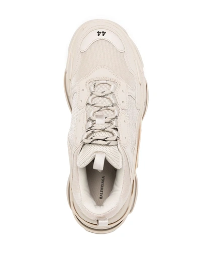 Shop Balenciaga Triple S Low-top Sneakers In Neutrals