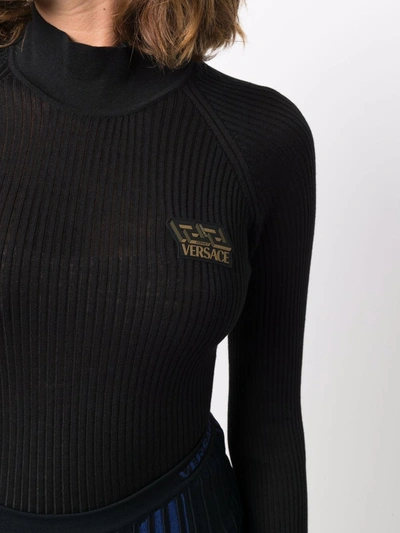 Shop Versace Logo-patch Ribbed-knit Top In Schwarz