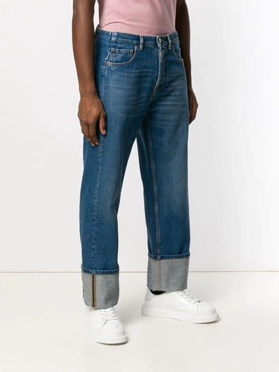 Shop Valentino Turn-up Wide-leg Jeans In Blue