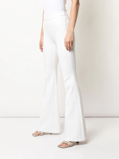 Shop Rosetta Getty Pintuck Flared Trousers In White