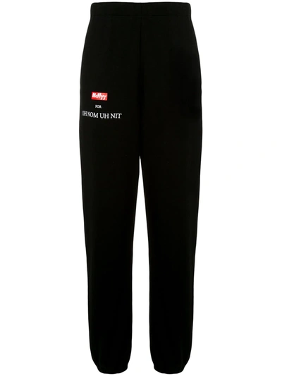 Shop Ih Nom Uh Nit Branded Track Pants In Black