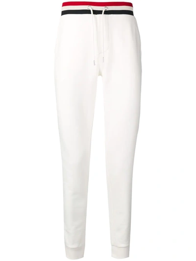 Shop Moncler Striped Waistband Trousers In White