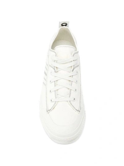 Shop Diesel S-astico Sneakers In White