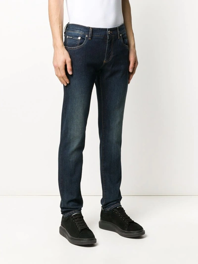 Shop Dolce & Gabbana Distressed Detail Jeans In Blue