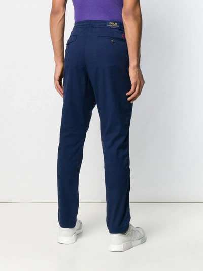 Shop Polo Ralph Lauren Embroidered Logo Trousers In Blue