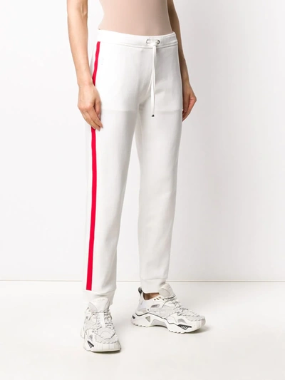 Shop Moncler Stripe Detail Logo Track Trousers In White