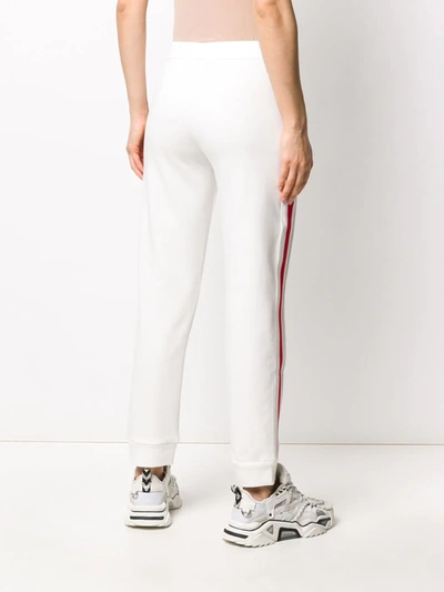 Shop Moncler Stripe Detail Logo Track Trousers In White