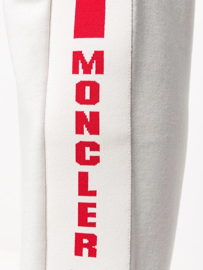 Shop Moncler Stripe Detail Logo Track Trousers In White