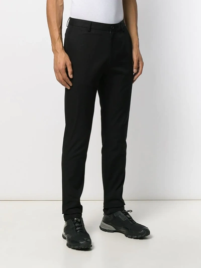 Shop Burberry Slim-fit Chinos In Black