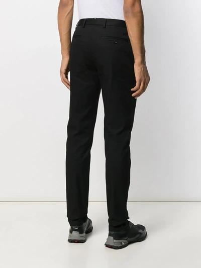 Shop Burberry Slim-fit Chinos In Black