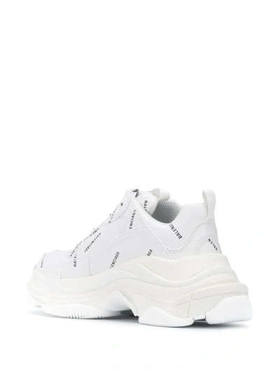 Shop Balenciaga All-over Logo Triple S Sneakers In White