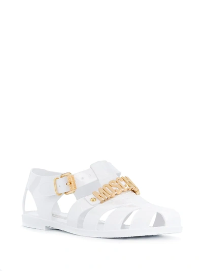 Shop Moschino Logo Jelly Sandals In White
