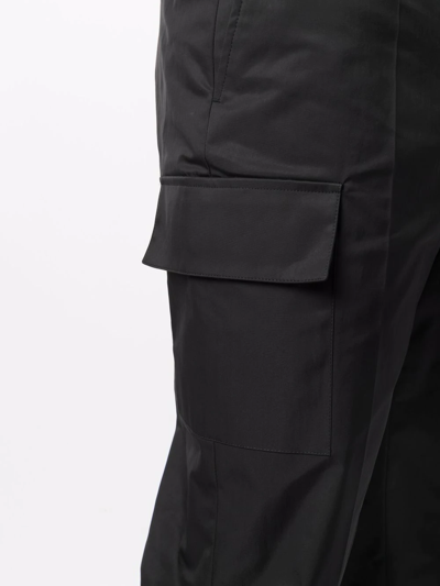 Shop Valentino Flap Pocket Cargo Style Trousers In Black