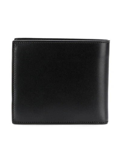 Shop Saint Laurent East/west Bifold Wallet In Black