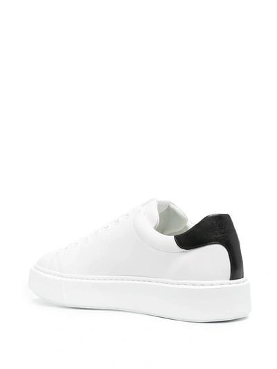 Shop Karl Lagerfeld Debossed Leather Lace-up Sneakers In White
