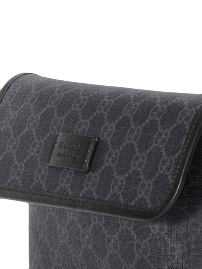 Shop Gucci Gg-pattern Coated-canvas Belt Bag In Black