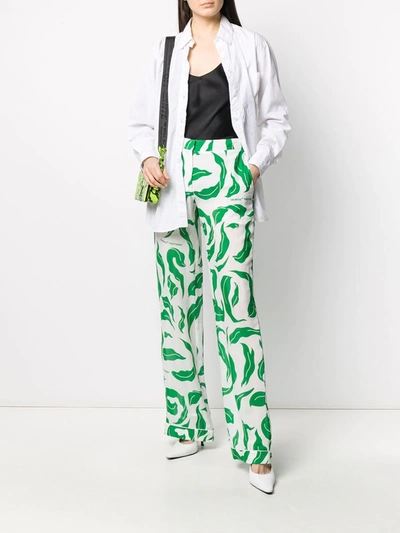 Shop Off-white Leaves Illusion Palazzo Pants In White