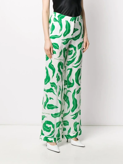 Shop Off-white Leaves Illusion Palazzo Pants In White