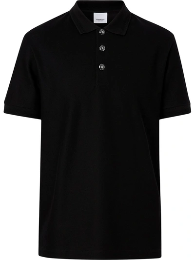 Shop Burberry Embossed Buttons Polo Shirt In Black