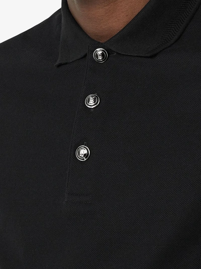 Shop Burberry Embossed Buttons Polo Shirt In Black