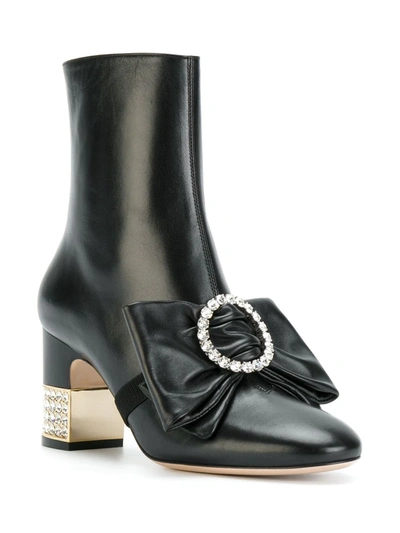 Shop Gucci Stone Ankle Boots In Black