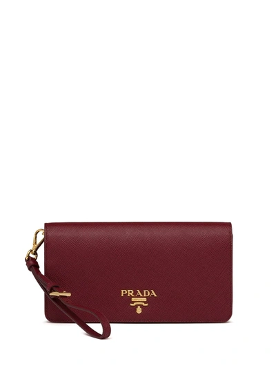 Shop Prada Logo Plaque Saffiano Mini Bag In Red