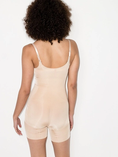 Shop Spanx Oncore Mid-thigh Bodysuit In Neutrals