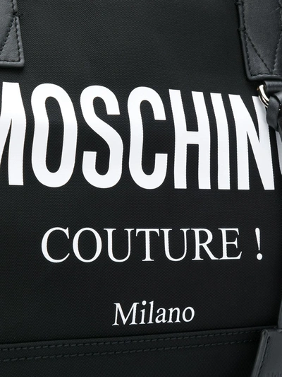 Shop Moschino Logo Print Weekender In Black