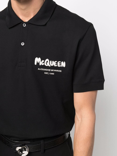 Shop Alexander Mcqueen Graffiti-logo Polo Shirt In 黑色