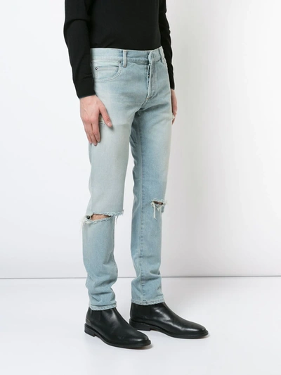Shop Balmain Ripped Slim Jeans In Blue