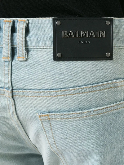 Shop Balmain Ripped Slim Jeans In Blue