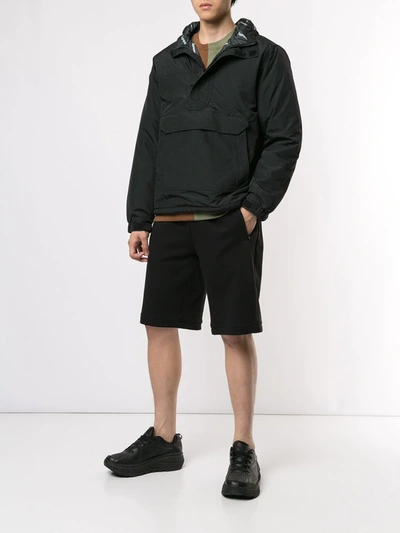 Shop Supreme Half-zip Hooded Windbreaker In Black