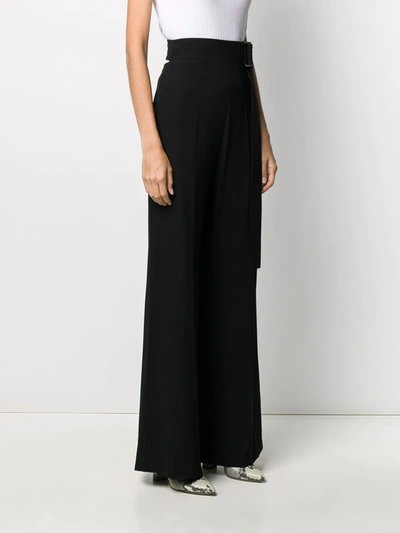 Shop Victoria Beckham Cutout-back Flared Trousers In Black