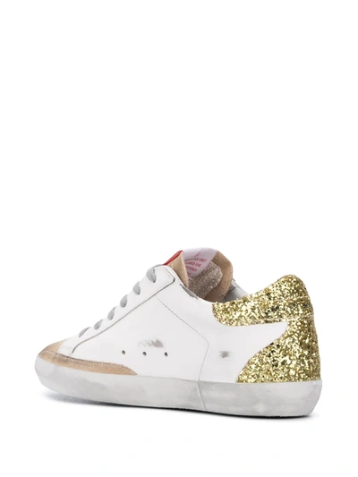 Shop Golden Goose Super-star Low-top Sneakers In White