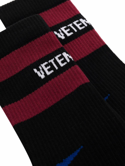 Shop Vetements Logo-print Ribbed Socks In Black