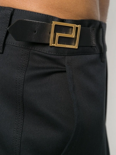 Shop Versace Logo Tab Tailored Trousers In Black