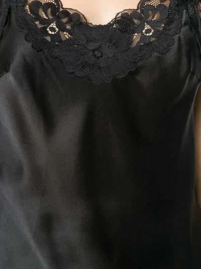 Gold Hawk Black Sleeveless Top With Adjustable Spaghetti Straps And Floral Emellishment In Black