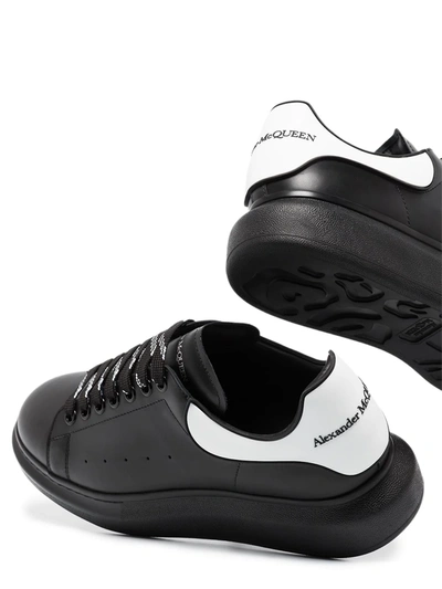 Shop Alexander Mcqueen Oversized Leather Sneakers In Black