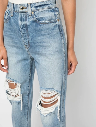 Shop Khaite High-waisted Distressed Jeans In Blue