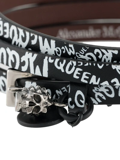 Shop Alexander Mcqueen Skull Graffiti Print Bracelet In Black