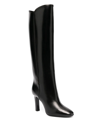 Shop Saint Laurent Jane Monogram Leather Boots In Black