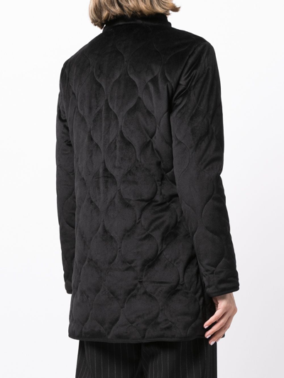 Shop Unreal Fur Moon Shadow Quilted Jacket In Schwarz