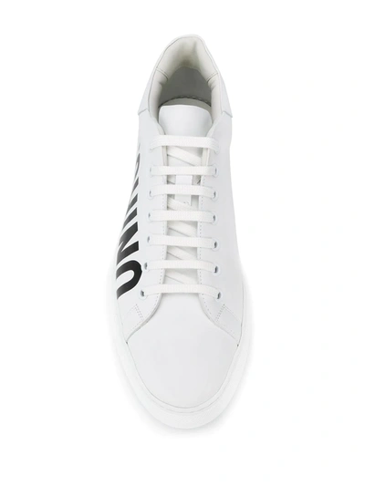 Shop Moschino Printed Logo Sneakers In White