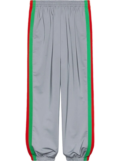 Shop Gucci Reflective Side Stride Track Pants In Silver