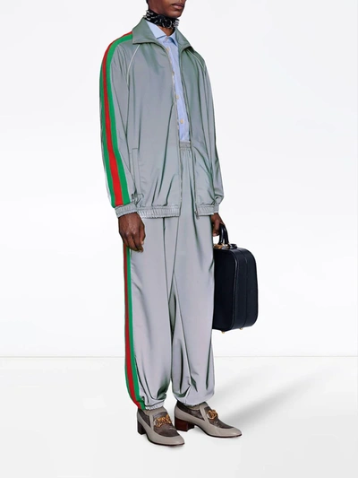 Shop Gucci Reflective Side Stride Track Pants In Silver