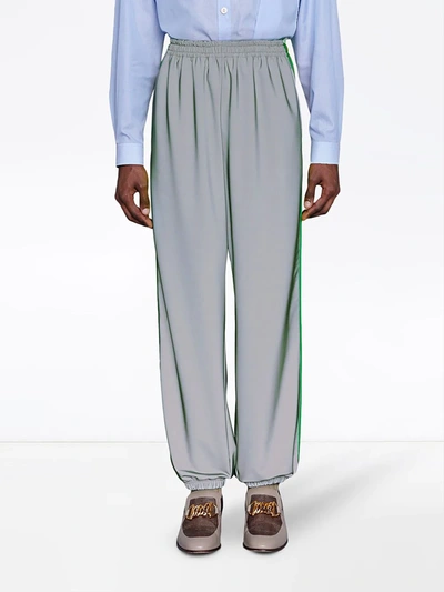 Shop Gucci Reflective Side Stride Track Pants In Silver