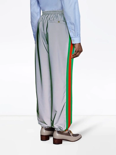 Shop Gucci Reflective Side Stride Track Pants In Silver