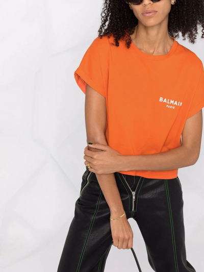 Shop Balmain Cropped Flocked-logo Short-sleeve T-shirt In Orange
